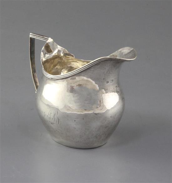 A George III provincial silver helmet shaped cream jug, by Dorothy Langlands, 2.5 oz.